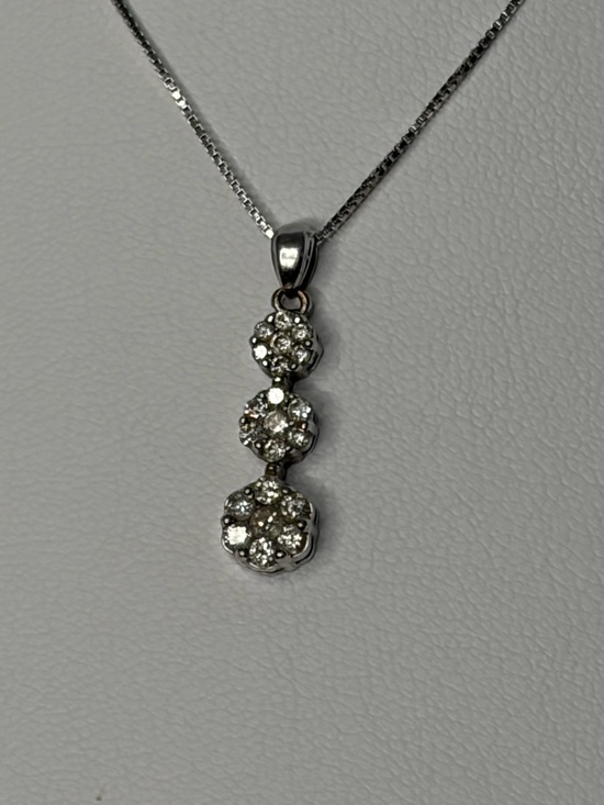 Jewelry - 10k white gold 3 diamond pendant .